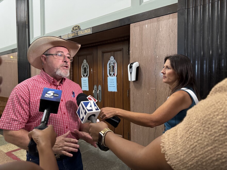 Rep. Justin Humphrey speaks with reporters after Coyle's recusal on Aug. 14, 2025.