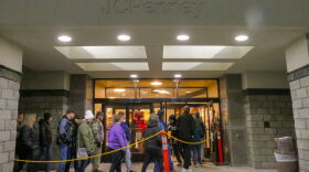 Shoppers file into JCPenney at the Spokane Valley Mall at the opening of business on Black Friday.