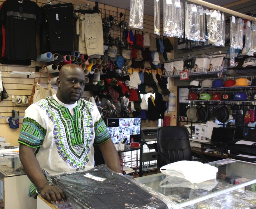 Moe Toure runs Toure Apparel in a strip mall on one of Vulcan Real Estate's 23rd Avenue properties.