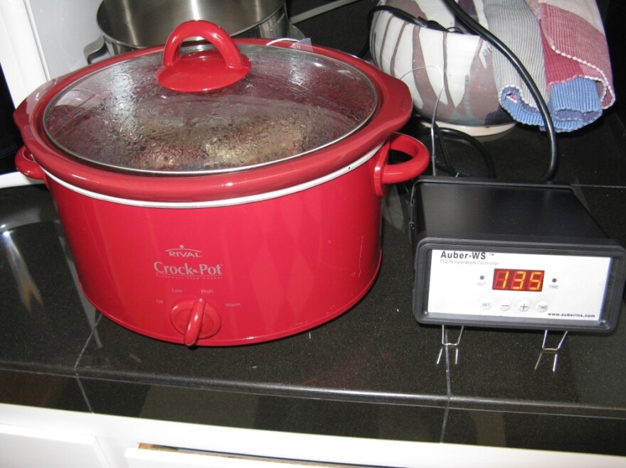 <p>A little tinkering turns a Crock Pot into a sous vide cooker. Sous vide cooking is traditionally expensive, but people are getting creative by constructing their own cooking rigs out of household appliances.</p>