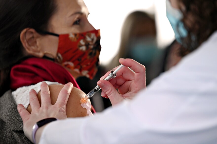 HARTFORD, CT - December 14, 2020: Hartford Healthcare workers receive the Pfizer BioNTech COVID-19 vaccine following a press conference at Hartford Hospital announcing the vaccine’s arrival in Connecticut earlier that morning. 