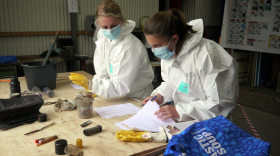 Volunteers tally the type of plastic captured.