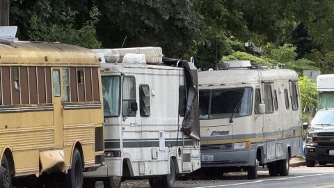 Vehicles housing residents along Martin Luther King Jr. Way in Seattle's Central District