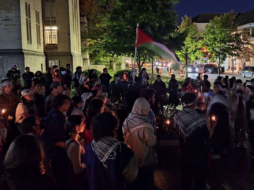 A candlelight vigil for Palestine at IU's Sample Gates.