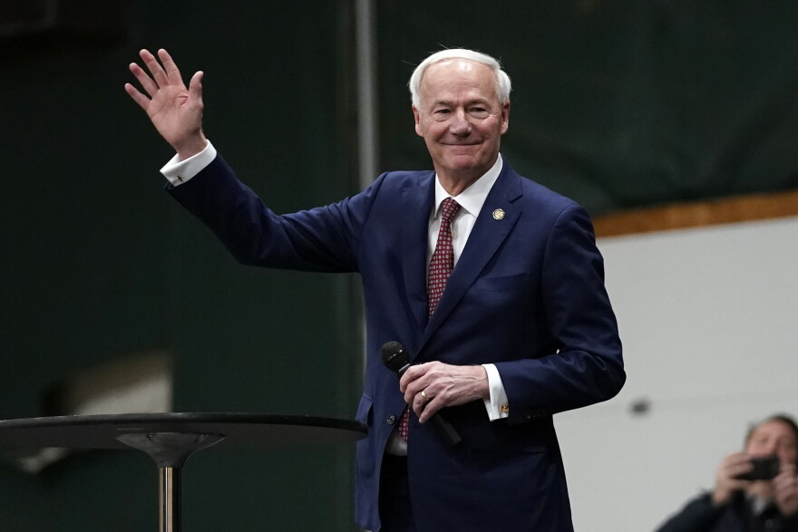Republican presidential candidate former Arkansas Gov. Asa Hutchinson speaks at a caucus site at Horizon Events Center, in Clive, Iowa, Monday, Jan. 15, 2024. 