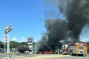 Firefighters are seen battling a blaze outside the Knights Inn on Route 315 in Jenkins Township on Wednesday afternoon, Sept. 3.