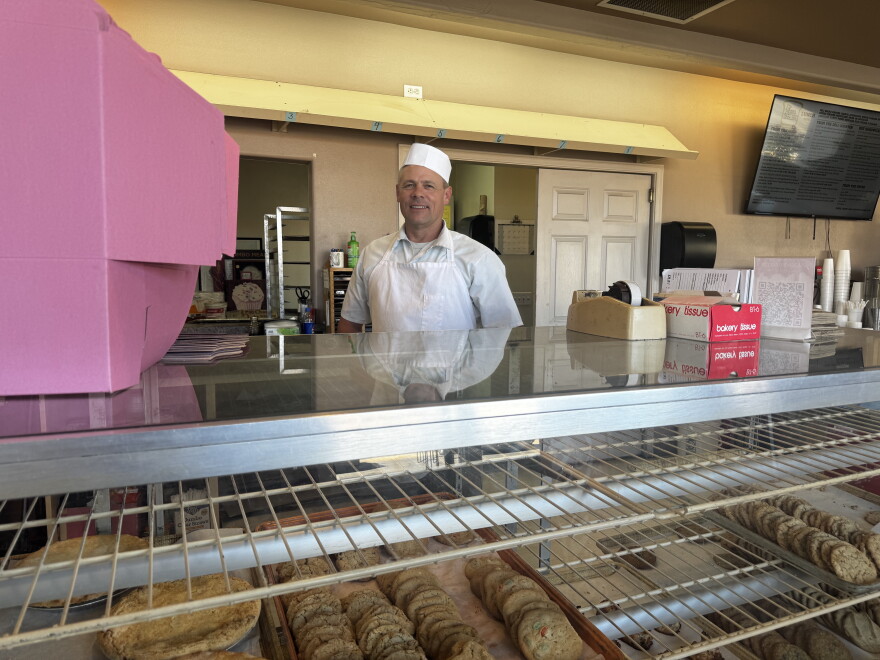 Craig Fisher smiles at the camera. After 18 years of work as a baker, this loss feels personal.
