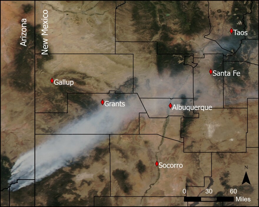 MODIS satellite image demonstrates actively burning wildfires in Apache-Sitgreaves National Forests and atmospheric transfer of the smoke from the burn sites to central New Mexico. the smoke can travel for thousands of miles, and as fires become more common, researchershave linked exposure to their smoke to worse mental health outcomes.