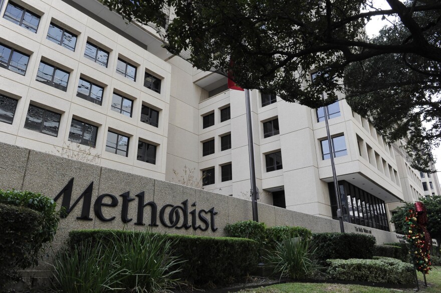 Trees and shrubs line the street in front of Methodist Hospital in Houston's Medical Center in 2012. (Pat Sullivan/AP)