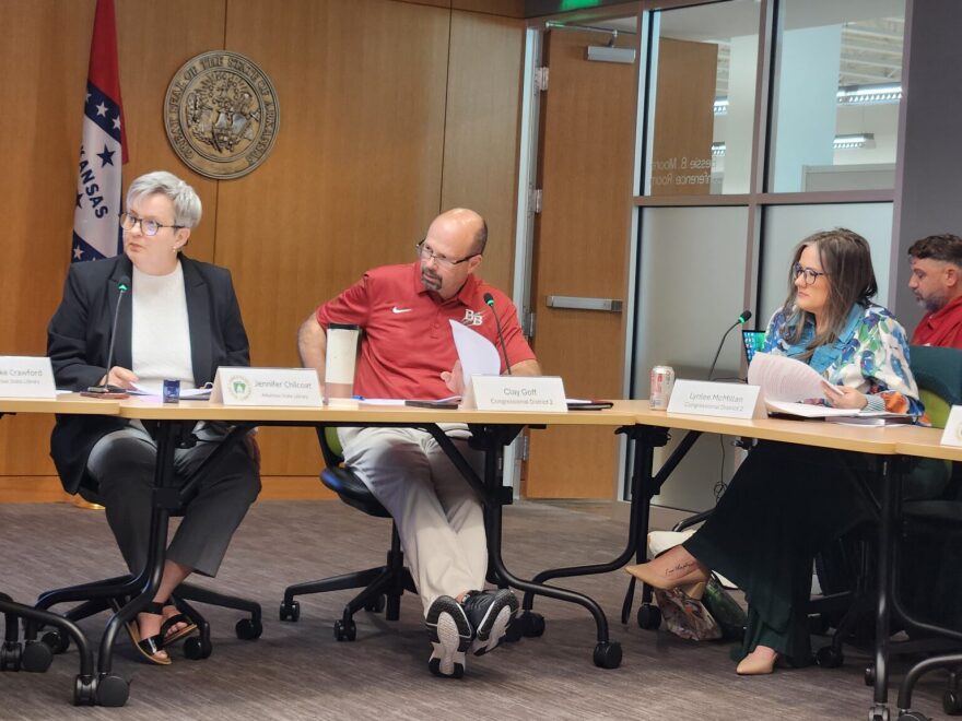 From left: Arkansas State Library Director Jennifer Chilcoat, State Library Board Chairman Clay Goff and board member Lynlee McMillan listen to discussion of proposed rules for libraries to receive state funding at the board’s quarterly meeting on May 8, 2026.