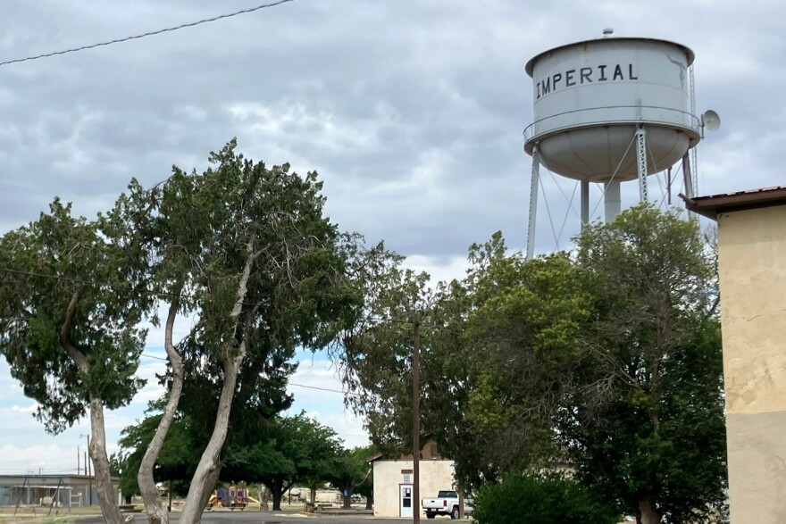 A water tower looms over the small town of Imperial in Pecos County, Texas, where for years drinking water has had excess radium.