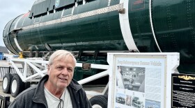 Larry Newland at Morro Bay Maritime Museum in front of US Navy (DSRV) Deep Submergence Rescue vessel