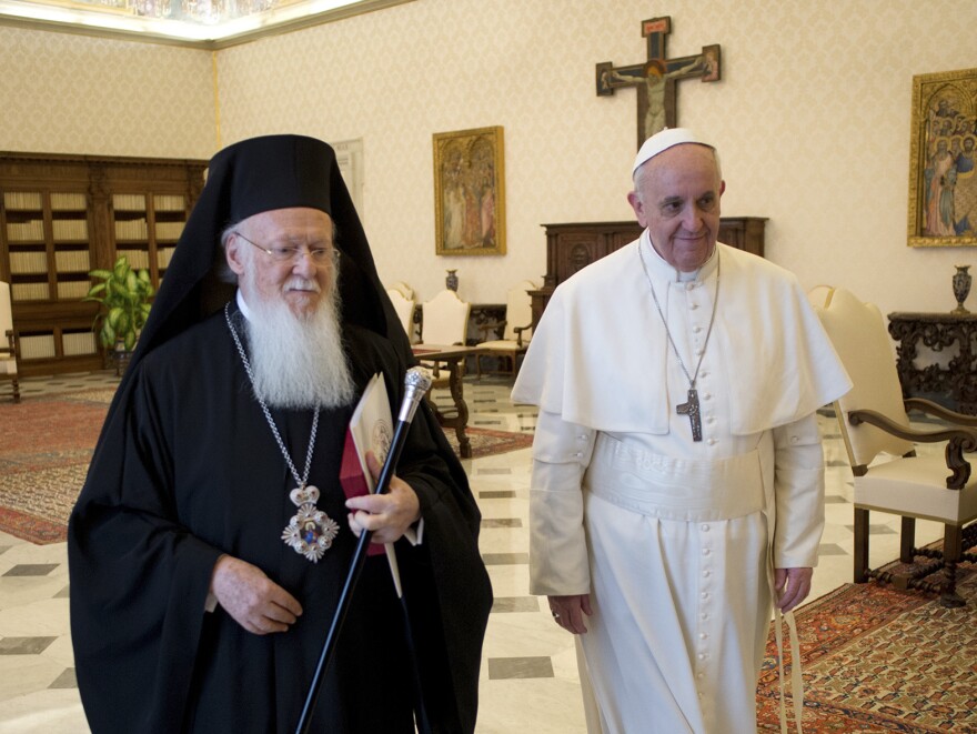 Pope Francis meets Bartholomew I, the first ecumenical patriarch to attend the installation of a pope since 1054, at the Vatican on March 20, 2013.