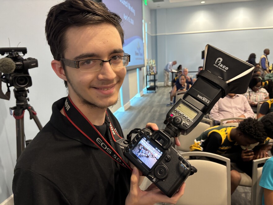 Kelvin Verhovlyak, 16, is an aspiring filmmaker and junior at Inlet Grove Community High School. He said the "Community Voices" has allowed him to shoot photos of Riviera Beach's city council in action and taught him how to report the news. “It’s also just a whole bundle of new opportunities,” he said.