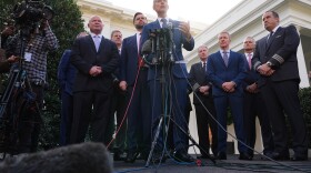 Transportation Secretary Sean Duffy speaks to the media alongside Sean O'Brien, President of the International Brotherhood of Teamsters, from left, Chris Sununu, president & CEO of Airlines for America, Vice President JD Vance and aviation industry representatives, about the impact of the government shutdown on the aviation industry, outside of the West Wing of the White House, Thursday, Oct. 30, 2025, in Washington. (AP Photo/Jacquelyn Martin)