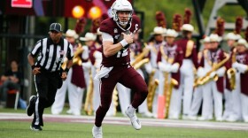 Jacob Clark runs the ball down the field in Plaster Stadium last year as they face the Youngstown State Penguins