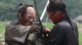 Masachika Ichimura and Koji Yakusho square off in Takashi Miike's classic period epic <em>13 Assassins. </em>David Edelstein says the movie's "mixture of bloodletting and exultation would make Sam Peckinpah sit up in his grave and howl with joy."