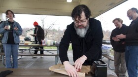 Jonathan Asher prepares his next steak for toasting. People gathered through the Columbia Reddit page to cook steaks in toasters on Nov. 22, 2025.