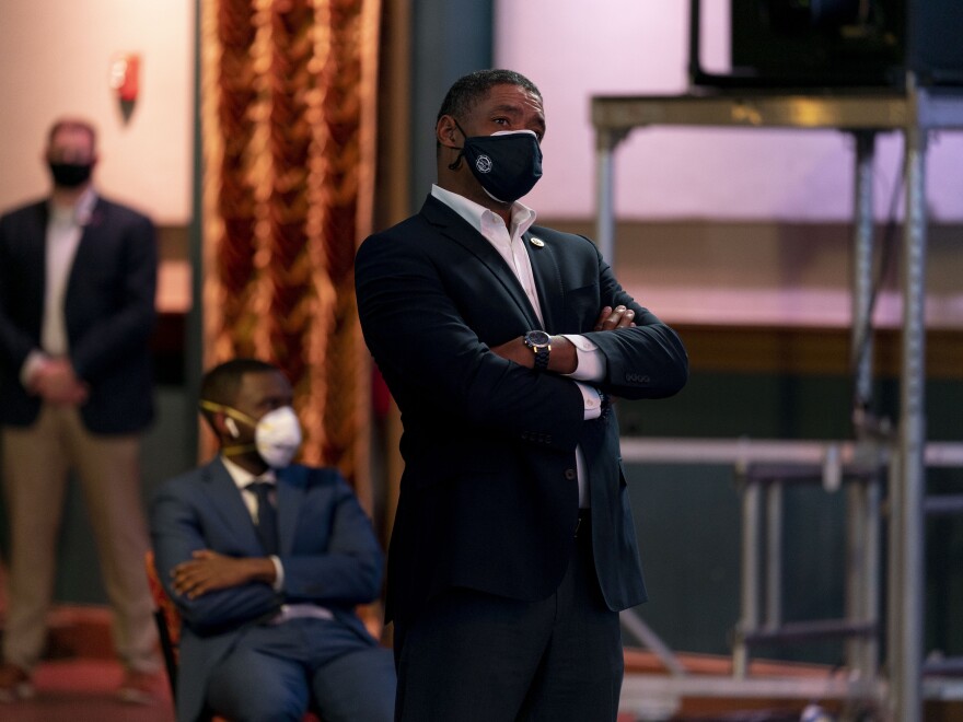 Rep. Cedric Richmond, D-La., right, watches as Democratic presidential candidate former Vice President Joe Biden appears on a "Zoom with Oprah Winfrey" virtual show at The Queen theater in Wilmington, Del., Wednesday, Oct. 28, 2020. (AP Photo/Andrew Harnik)