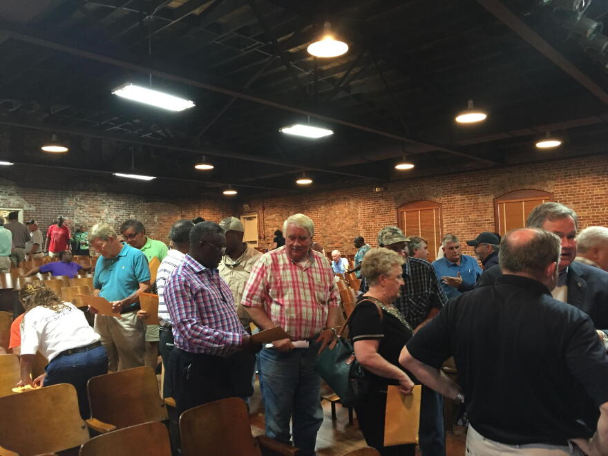 During a 2016 town hall meeting, Williamsburg County residents learn about the state's flood recovery program. Officials report the program is on track to help 1500 households. 