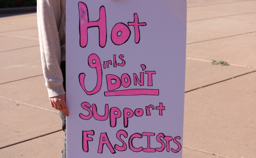 Demonstrators hold signs protesting College Republicans United’s event that asked students to report classmates to ICE at ASU’s Tempe campus on Jan. 31, 2025.