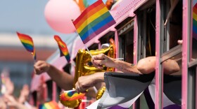 Parade participants wave to spectators during the Nashville Pride Parade Saturday, June 24, 2023, in Nashville, Tennessee.