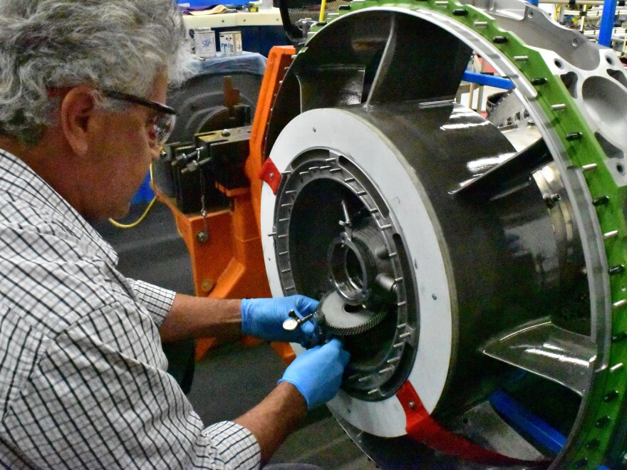 A worker builds an aircraft engine at Honeywell Aerospace in Phoenix in 2016. Aerospace is among the manufacturing sectors that could be affected by import tariffs on steel and aluminum.