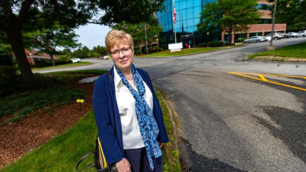 Michele Cantara stands outside of Chelmsford Immigration Court. (Jesse Costa/WBUR)