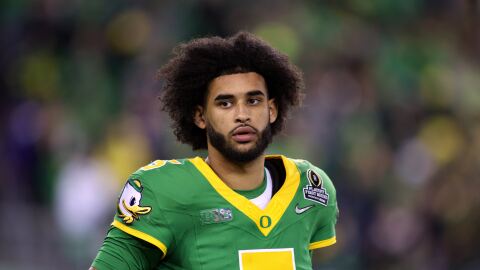 Oregon quarterback Dante Moore (5) looks on during the first half of the first round of the NCAA College Football Playoff against James Madison, Saturday, Dec. 20, 2025, in Eugene, Ore. (AP Photo/Lydia Ely)