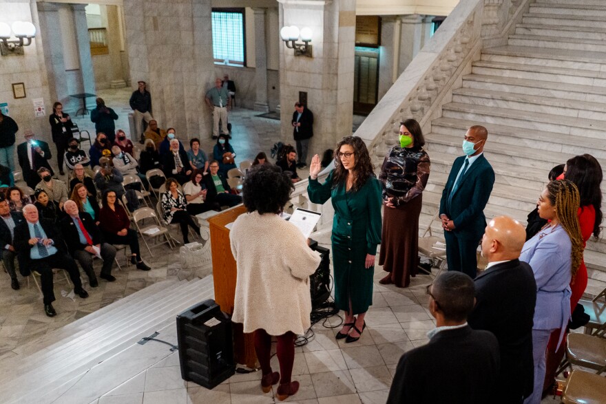 Megan Green is sworn in as the first woman St. Louis Board of Aldermen president by Michelle Higgins, senior pastor at St. John’s Church, on Monday, Nov. 28, 2022, during a ceremonial inauguration in City Hall. Green replaces Lewis Reed, who resigned after pleading guilty to federal corruption charges earlier this year.