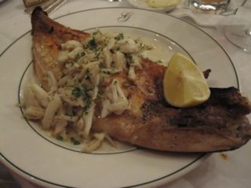 Pompano with crab meat and butter, a Creole classic at Galatoire's Restaurant.