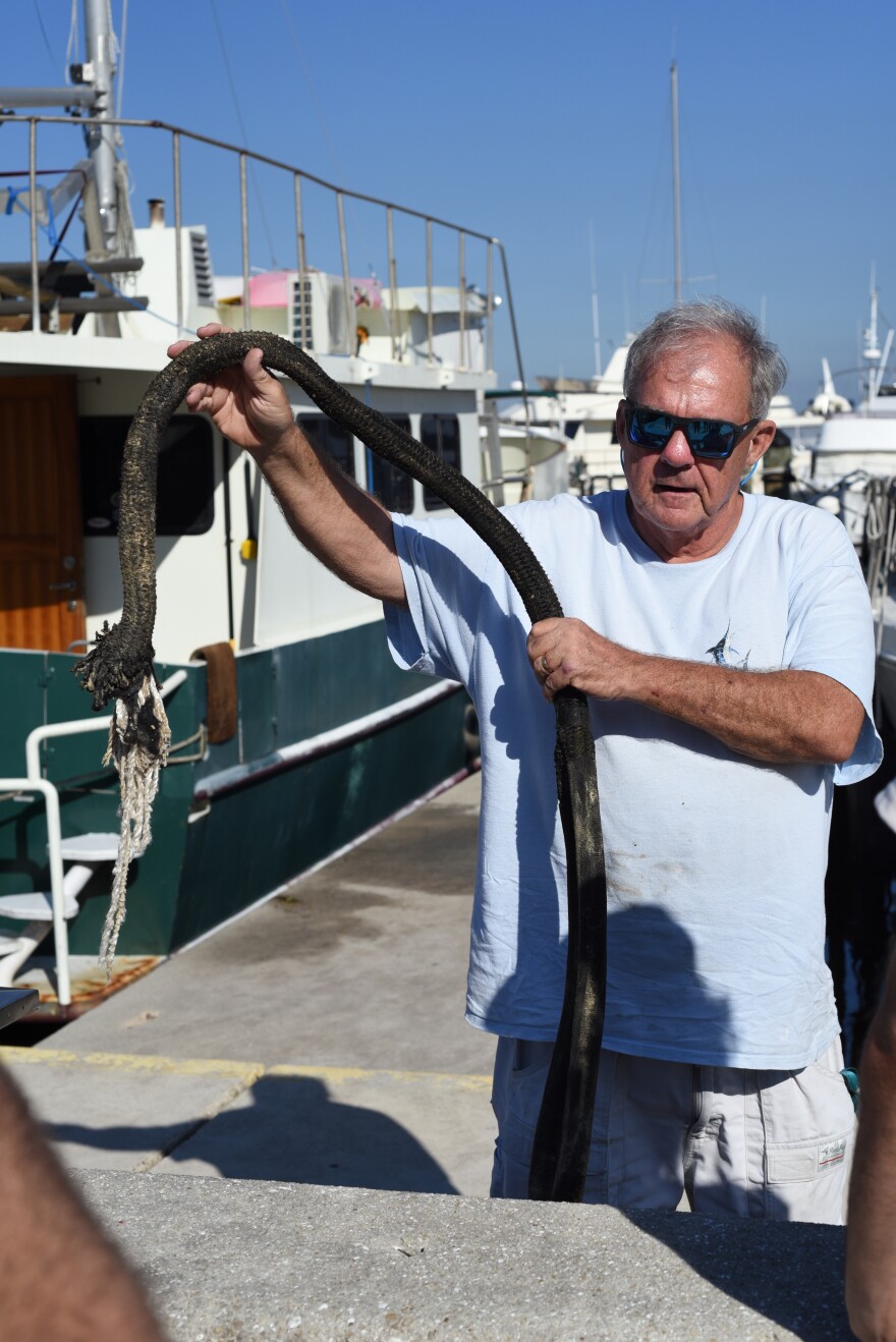 Bill Westberry holds a broken dock line