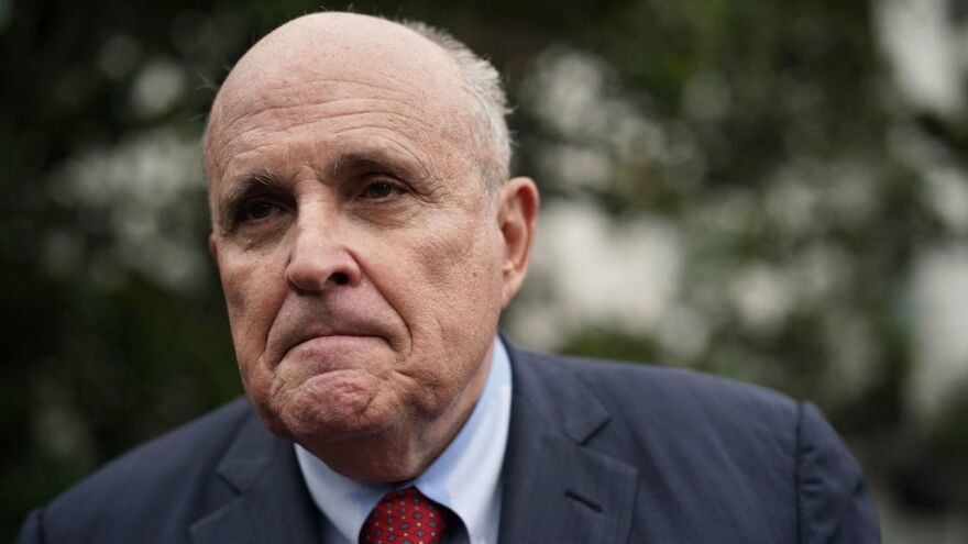 Rudy Giuliani, former New York City mayor and current lawyer for President Trump, speaks to members of the media during a White House Sports and Fitness Day last month. Giuliani suggested Friday that presidential pardons could be given to people caught up in the Mueller investigation.