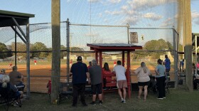 Parents and other family members gather at Field 1 at Edwards Road Complex for a 10-and-under baseball game. Tuesday and Wednesday marked the first day of regular season games for the spring recreational season. (Kevin Perez/WUFT News)