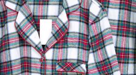 Matching pajamas hanging up. (Kampee Patisena/Getty Images)