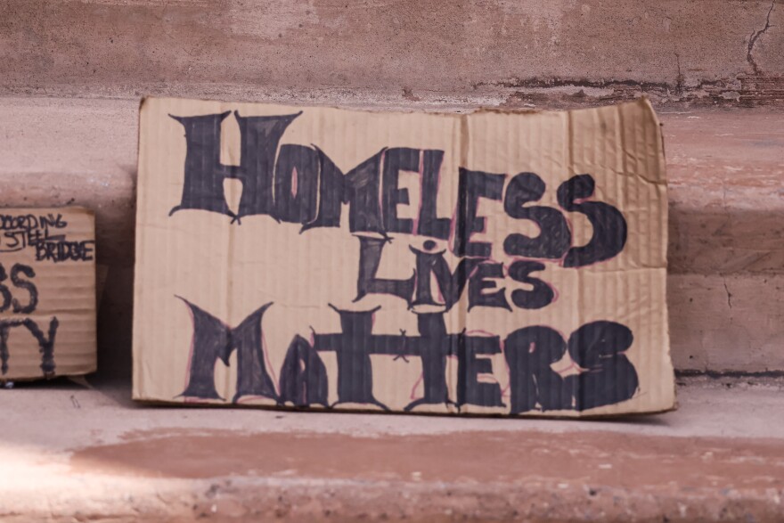 A protest sign at Albuquerque's Civic Plaza near the site of the press conference that reads "Homeless Lives Matter"