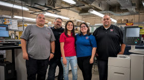The Arizona Western College Print Services team poses for a group photo inside the campus print shop in Yuma, Arizona. From left to right: Scott Rico, Marco Castillo, Daniela Lopez Hernandez, Saghey Barcenas, and Saul Robles.