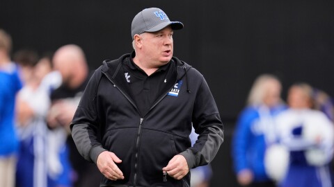 Kentucky head coach Mark Stoops walks the field before an NCAA college football game against Vanderbilt, Saturday, Nov. 22, 2025, in Nashville, Tenn.