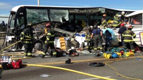 A photo from the Seattle Fire Department's Twitter feed shows  the side of a bus ripped open after a collision with a duck amphibious vehicle on the Aurora Bridge in Seattle, September 24, 2015. . 