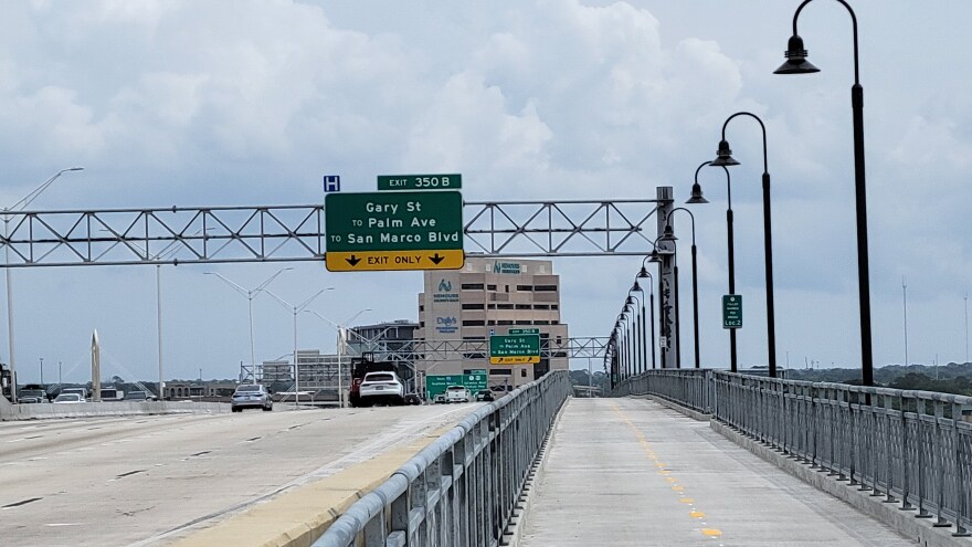 This is the midpoint of the new 4,654-foot-long, 12-foot-wide bicycle and pedestrian path adjacent to the Fuller Warren Bridge and I-95.