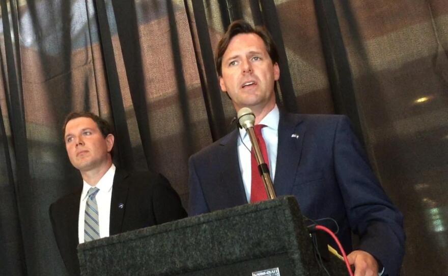 Former state auditor Adam Edelen (right) and Kentucky Sports radio host Matt Jones (left) introduce the New Kentucky Project in Lexington.