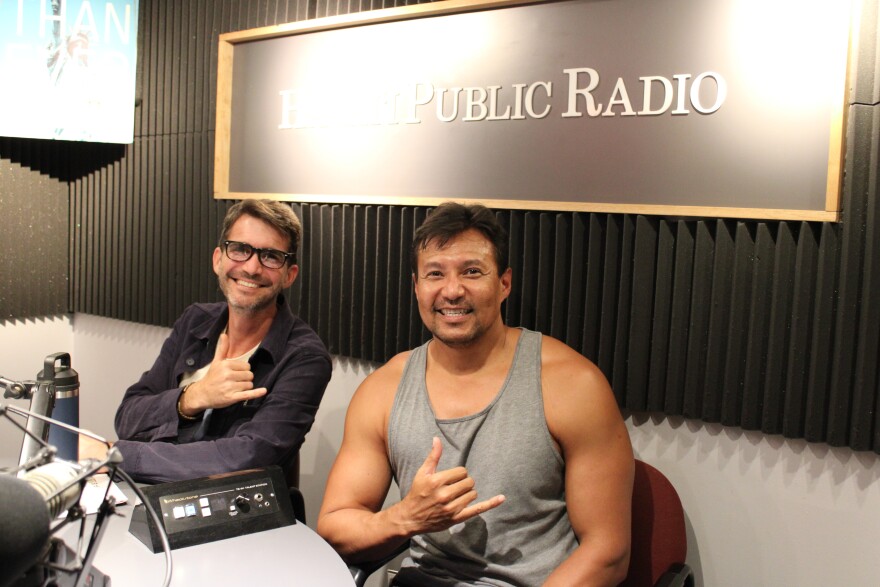 HPR's DW Gibson, left, with David Pang, owner of ʻIlio Products, right.