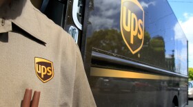 This April 25, 2011, file photo shows United Parcel Service driver Albert Palafox in Palo Alto, Calif.