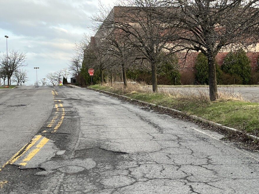 A crumbling road inside the mall near the former Macy's store.