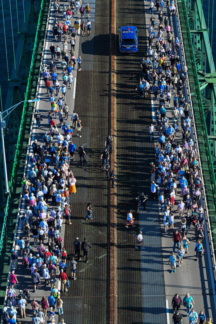 walkers on the Mackinac Bridge