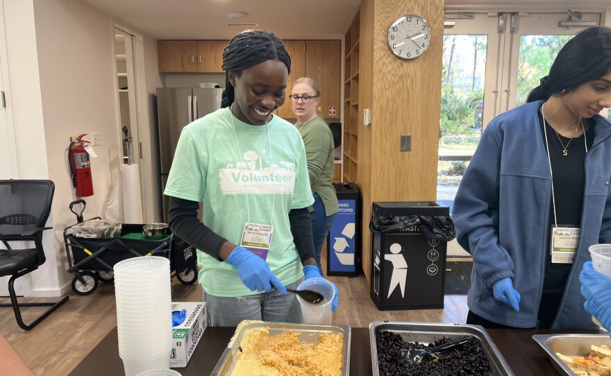 Miriam Masamba helps package food that will be donated to a community fridge on Nov. 11, 2025 during the Youth Climate Summit at the Durham Museum of Life and Science. Masamba helped planned this event as part of the Museum's Teen Advisory Council.