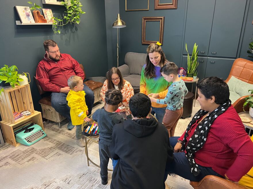 Families attend community story time at Whose Books every Saturday morning.