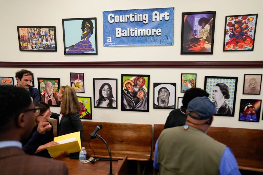 Artwork by Baltimore City Public School students is displayed at the Eastside District Court building in Baltimore in May. (Ulysses Muñoz/The Baltimore Banner)