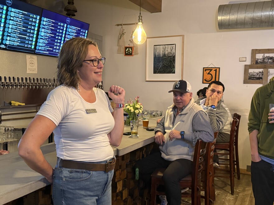 Mindy O'Neall announces her likely win to supporters at Lavelle's Taphouse, Oct. 7, 2025, saying that incumbent David Pruhs has conceded the 2025 City of Fairbanks mayoral race.