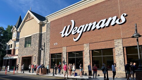 A line of customers await the highly anticipated grand opening of a new Wegman's in Norwalk, CT on July 23, 2025. This location is the first and only Wegmans in the state.